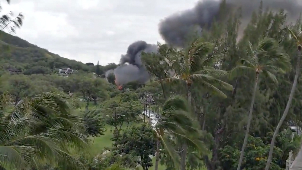 Smoke billowing from a fire at Kapi'Olani park where an ongoing shooting incident occurred in Honolulu, Hawaii in this still image obtained from a January 19, 2020 social media video. Twitter @HelloHiMattHere via REUTERS 
