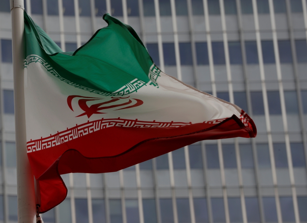 An Iranian flag flutters in front of the International Atomic Energy Agency (IAEA) headquarters in Vienna, Austria September 9, 2019. (REUTERS/Leonhard Foeger)