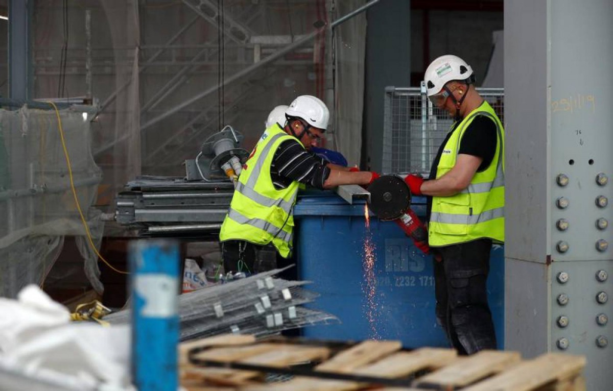 Workers are seen at the construction site of 22 Bishopsgate in London, Britain June 25, 2019. Picture taken June 25, 2019. Reuters/Hannah McKay