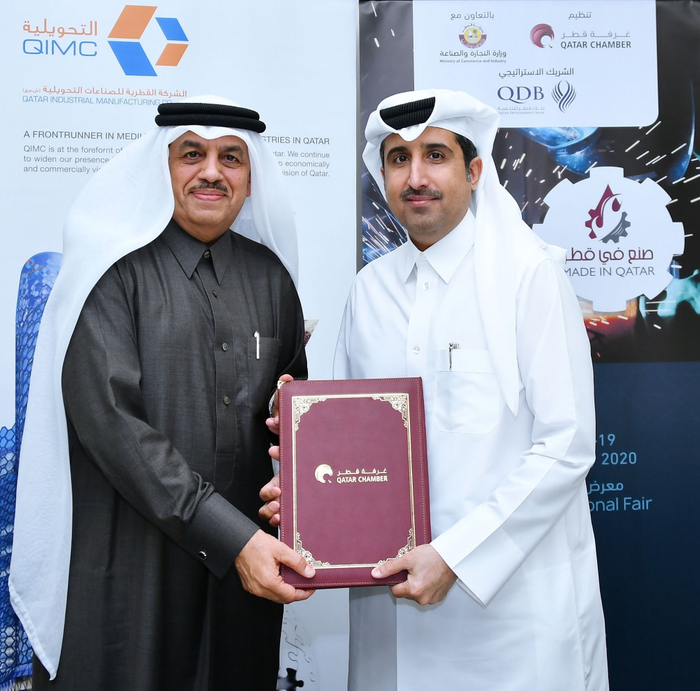 Qatar Chamber’s Director-General, Saleh bin Hamad Al Sharqi (right), and QIMC’s CEO Abdul Rahman Abdulla Al Ansari, after signing the sponsorship agreement in Doha recently.