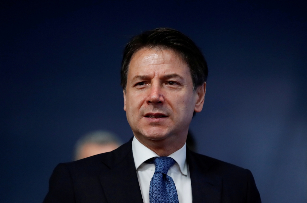  FILE PHOTO: Prime Minister of Italy Giuseppe Conte arrives to attend the European Union leaders summit, in Brussels, Belgium December 13, 2019. REUTERS/Christian Hartmann/Pool/File Photo 