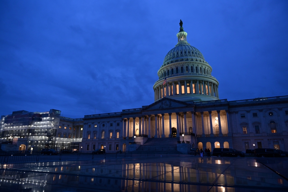 The U.S. Capitol is seen at night, on the fourth day of the Senate impeachment trial of U.S. President Donald Trump, in Washington, U.S., January 24, 2020. REUTERS/Erin Scott
 