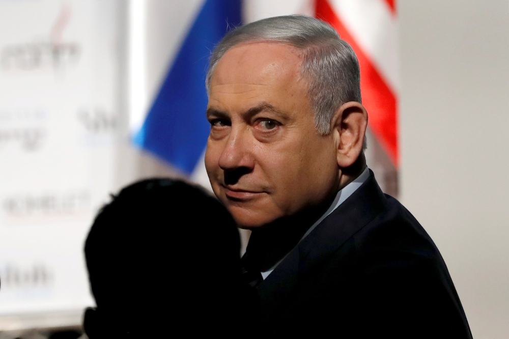 FILE PHOTO: Israeli Prime Minister Benjamin Netanyahu arrives to attend a conference in Jerusalem January 8, 2020 REUTERS/Ronen Zvulun/File Photo
 