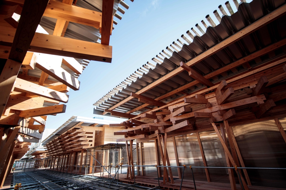 This picture shows wooden construction of the Village Plaza at the entrance of the Olympic Village in Tokyo on January 29, 2020. The organisers of the Tokyo Olympic Games unveiled the 