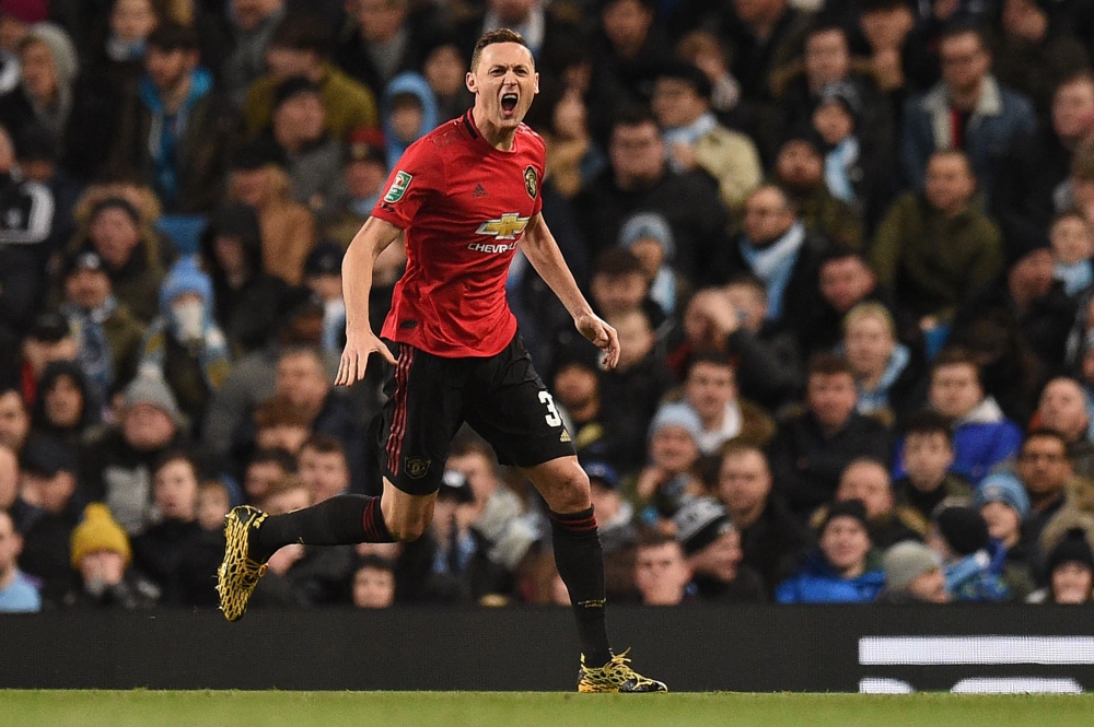 Manchester United's Serbian midfielder Nemanja Matic celebrates scoring the opening goal during the English League Cup semi-final second leg football match between Manchester City and Manchester United at the Etihad Stadium in Manchester, north west Engla