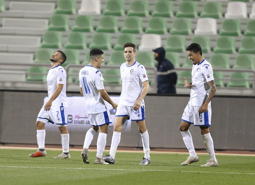 Al Khor's players celebrate their goal against Al Ahli yesterday.