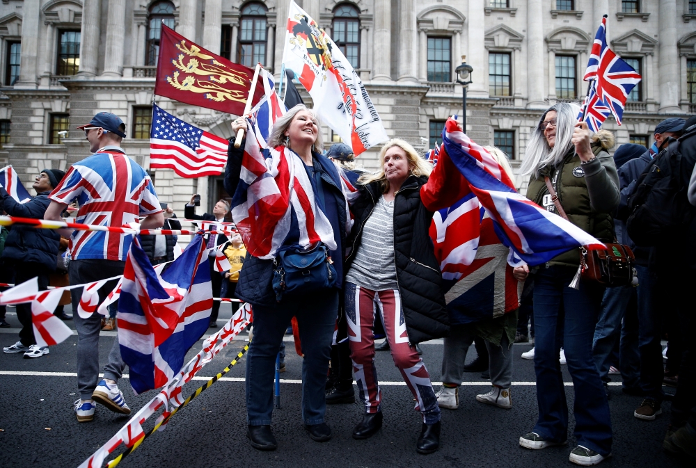 People celebrate Britain leaving the EU on Brexit day in London, Britain January 31, 2020. REUTERS/Henry Nicholls

