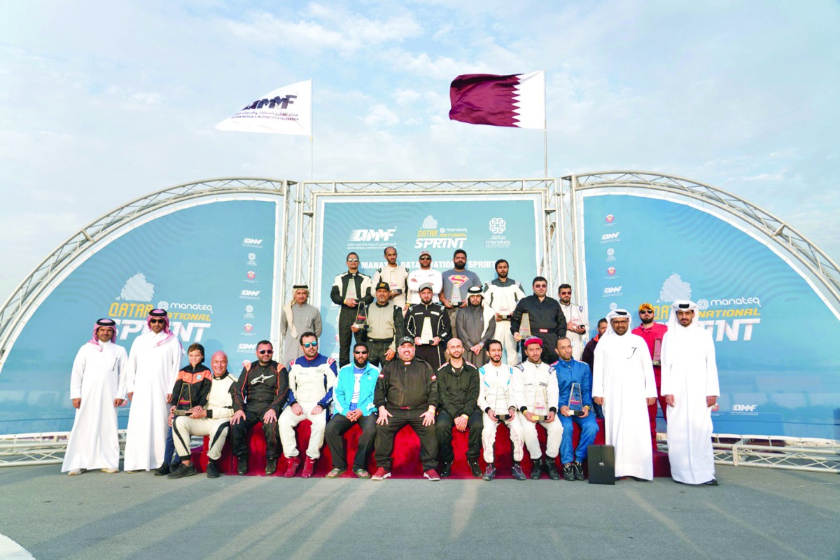 The podium winners of the second round of Qatar National Sprint Championship posing for a photograph with officials on Saturday.