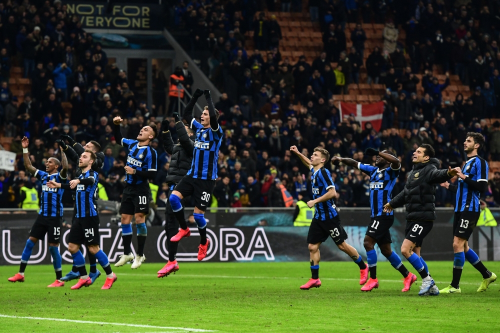 (From L) Inter Milan's English midfielder Ashley Young, Inter Milan's Danish midfielder Christian Eriksen, Inter Milan's Argentinian forward Lautaro Martinez, Inter Milan's Italian forward Sebastiano Esposito, Inter Milan's Italian midfielder Nicolo Barel