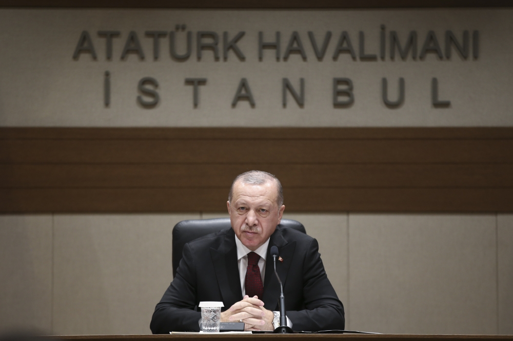  Turkish President Recep Tayyip Erdogan speaks to media ahead of his departure to Ukraine at the Ataturk Airport in Istanbul, Turkey on February 3, 2020. (Arif Hüdaverdi Yaman - Anadolu Agency)