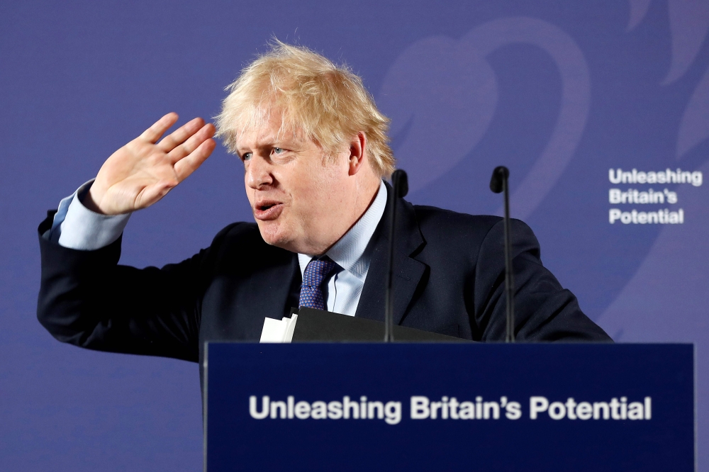 Britain's Prime Minister Boris Johnson reacts as he delivers a speech at the Old Royal Naval College in Greenwich, south east London on February 3, 2020. AFP pool/ Frank Augstein
 