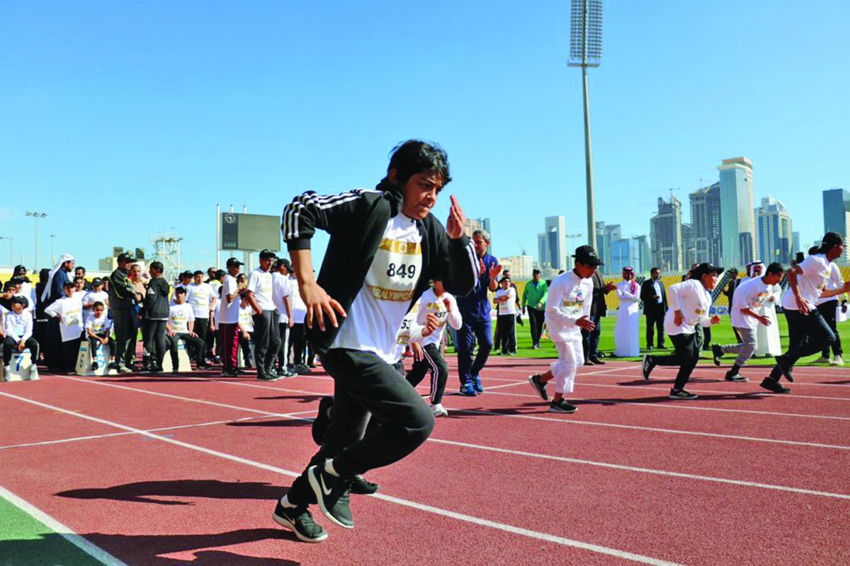 Children with special needs taking part in events during the Paralympic Day at the Suhaim bin Hamad Stadium, yesterday.