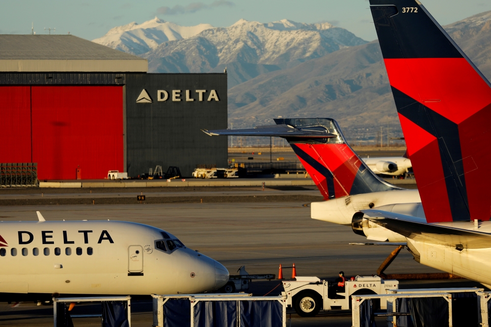 A Delta Air Lines flight is pushed out of its gate at the airport in Salt Lake City, Utah, US, January 12, 2018. Reuters / Mike Blake
