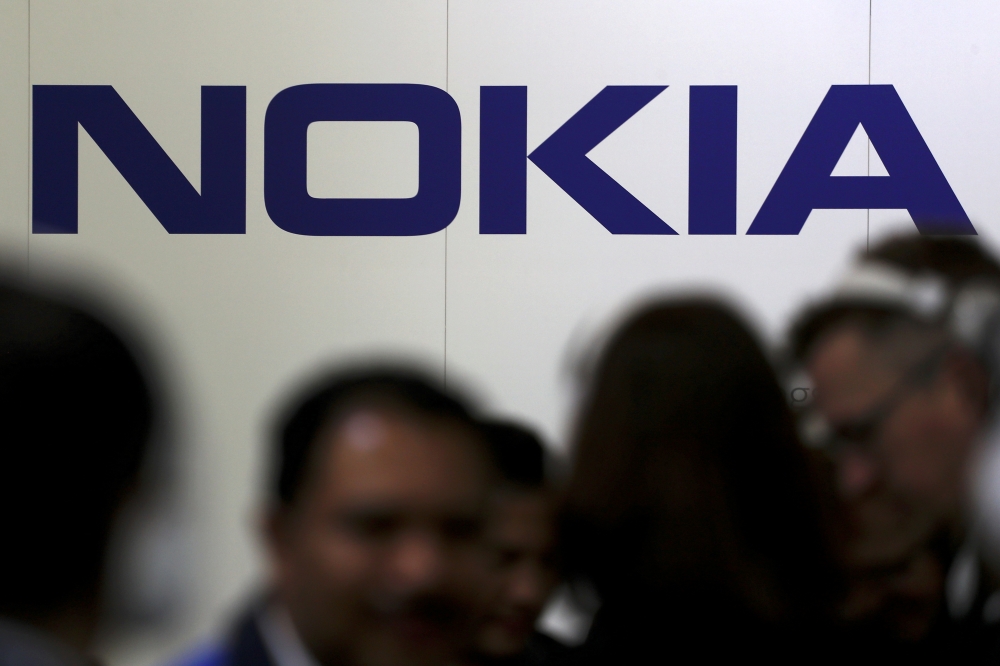 Visitors gather outside the Nokia booth at the Mobile World Congress in Barcelona, Spain, February 26, 2019. Reuters/Sergio Perez

