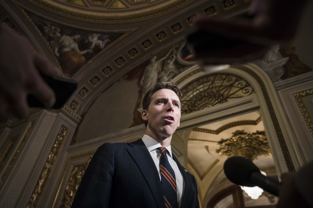 Senator Josh Hawley (R-MO) speaks to the press in the US Capitol during a break on the second day that Senators have the opportunity to ask questions during impeachment proceedings against US President Donald Trump on January 30, 2020 in Washington, DC. S