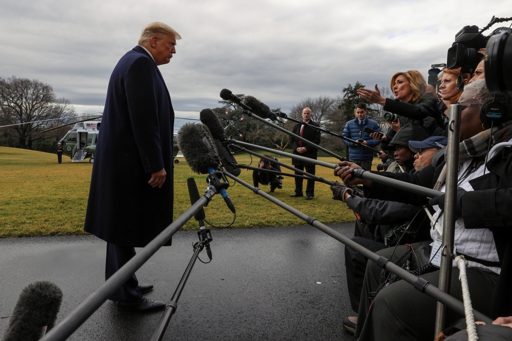 US President Donald Trump speaks to reporters as he departs for travel to North Carolina from Washington, U.S. February 7, 2020. Reuters/Jonathan Ernst