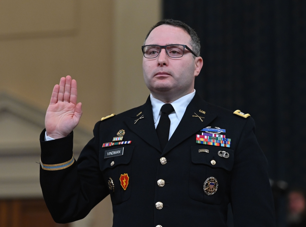 In this file photo taken on November 19, 2019 National Security Council Ukraine expert Lieutenant Colonel Alexander Vindman takes the oath before testifying before the House Intelligence Committee, on Capitol Hill in Washington, DC
