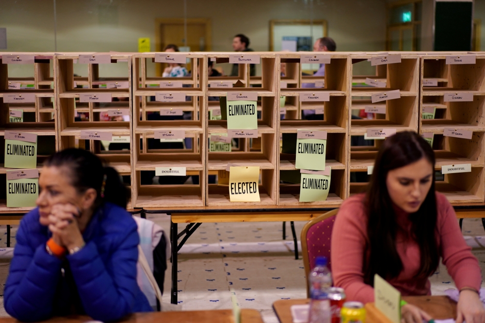 Staff members count votes in Ireland's national election, in Cork, Ireland, February 9, 2020. Reuters/Henry Nicholls
 