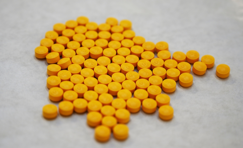 Tablets believed to be laced with fentanyl are displayed at the Drug Enforcement Administration’s Northeast Regional Laboratory on October 8, 2019, in New York. AFP  / Don Emmert