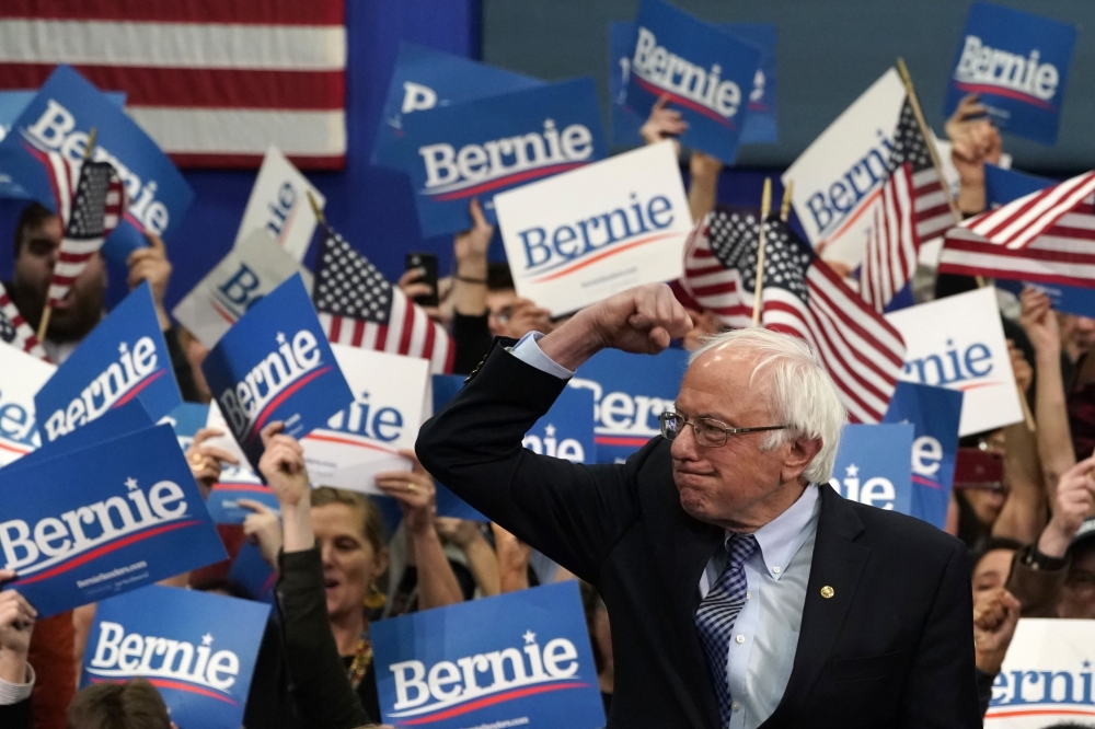 Democratic presidential hopeful Vermont Senator Bernie Sanders arrives to speak at a Primary Night event at the SNHU Field House in Manchester, New Hampshire on February 11, 2020. AFP / TIMOTHY A. CLARY