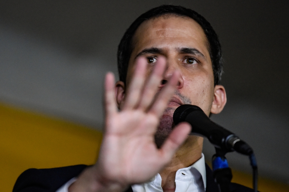 Venezuelan opposition leader Juan Guaido gives a speech at Bolivar Square after returning Caracas, Venezuela on February 11, 2020. Stringer - Anadolu Agency 