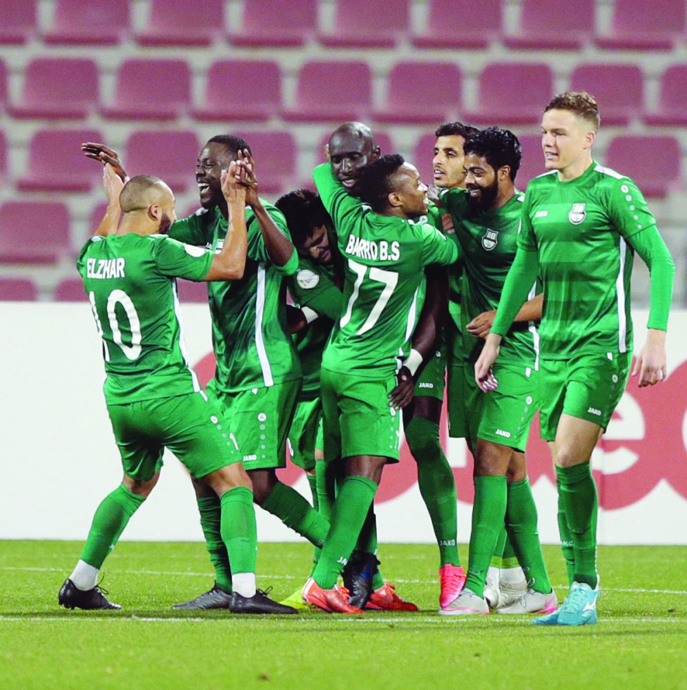 Al Ahli's players celebrate during an Amir Cup match in this file photo.