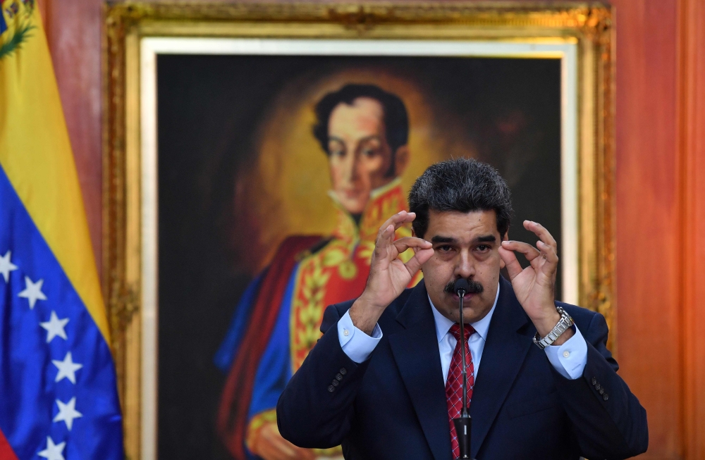 Venezuelan President Nicolas Maduro offers a press conference in Caracas on January 25, 2019. AFP /  Yuri Cortez