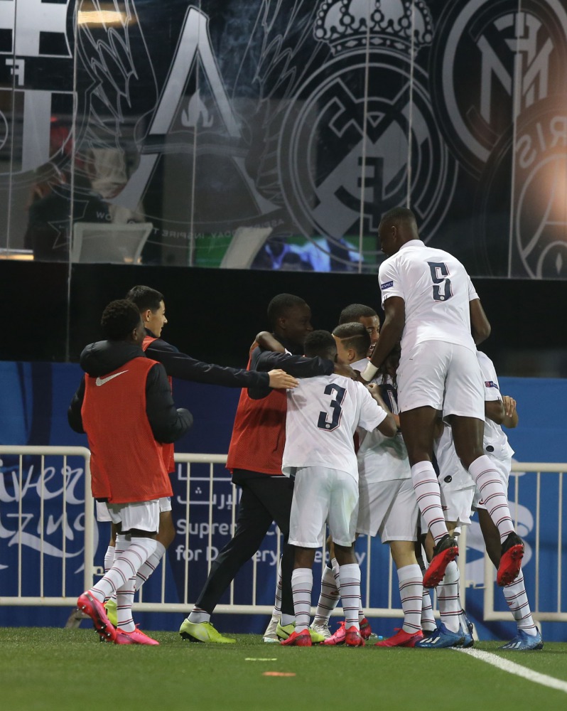 PSG players celebrate a goal yesterday. 
