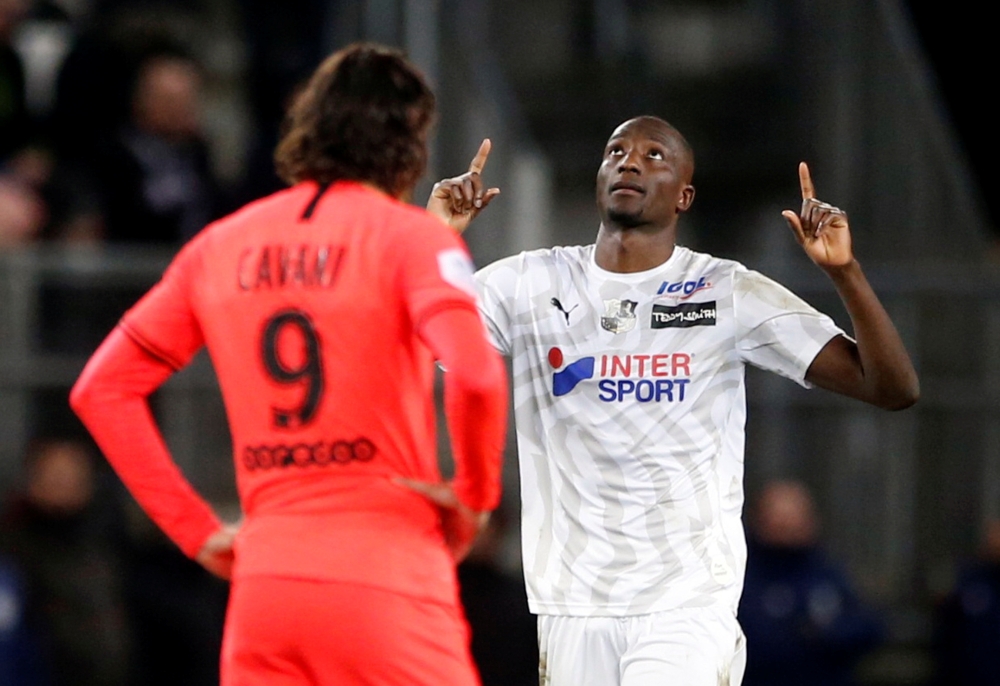 :Soccer Football - Ligue 1 - Amiens v Paris St Germain - Stade de la Licorne, Amiens, France - February 15, 2020 Amiens' Serhou Guirassy celebrates scoring their fourth goal REUTERS/Pascal Rossignol
