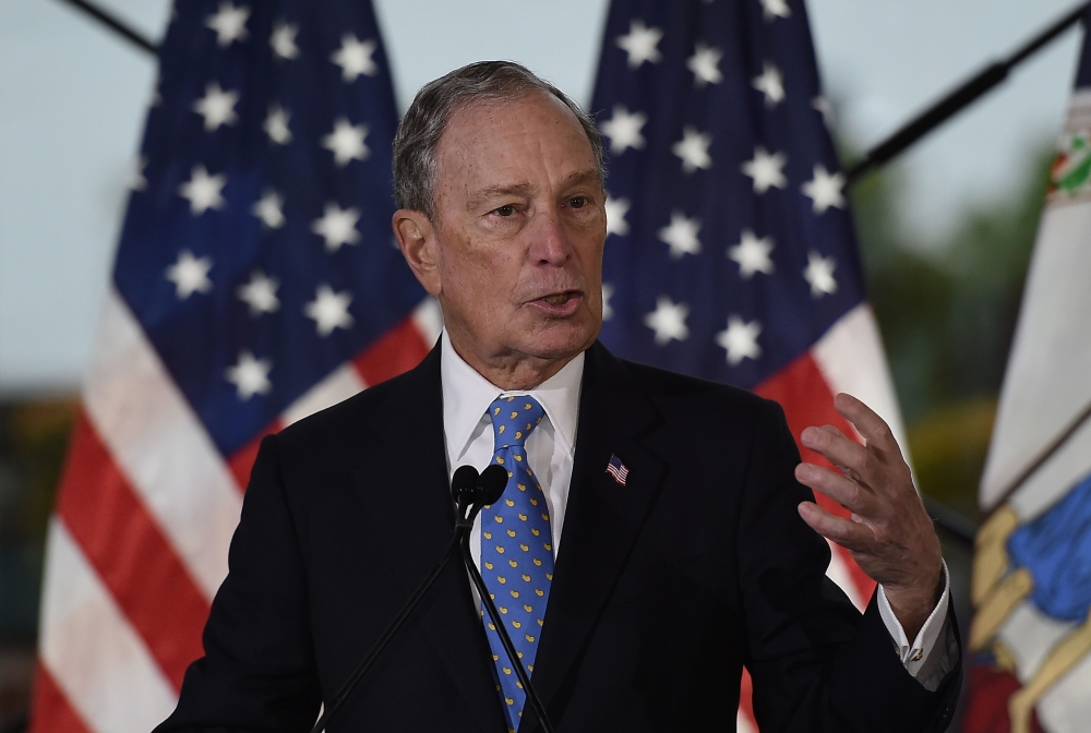 In this file photo taken on December 13, 2019 former New York Mayor and Democratic presidential candidate Michael Bloomberg speaks about his plan for clean energy during a campaign event at the Blackwall Hitch restaurant in Alexandria, Virginia. / AFP / O
