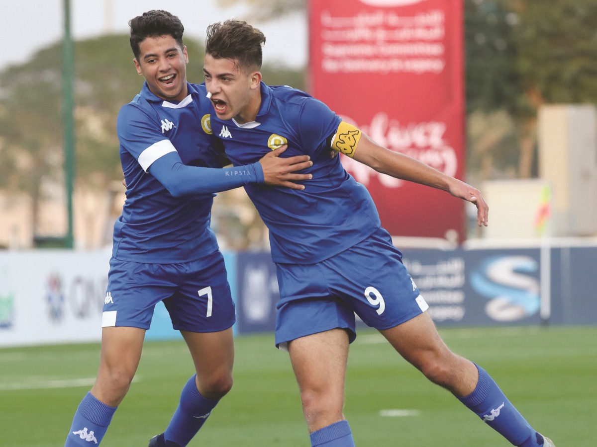 Mohammed VI Academy 's Skipper Omar Sadik (right) celebrates after scoring a hat-trick against Altinordu during their Al Kass International Cup match in Doha, yesterday.
