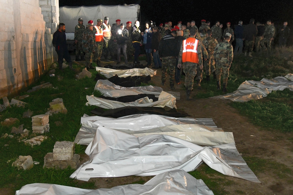 Syrian government forces uncovering a mass grave containing bodies of people reportedly believed to have died between 2012 and 2014, in al-Ubb in the eastern Ghouta region about 20 kilometres east of the capital Damascus, which was formerly held by rebel 
