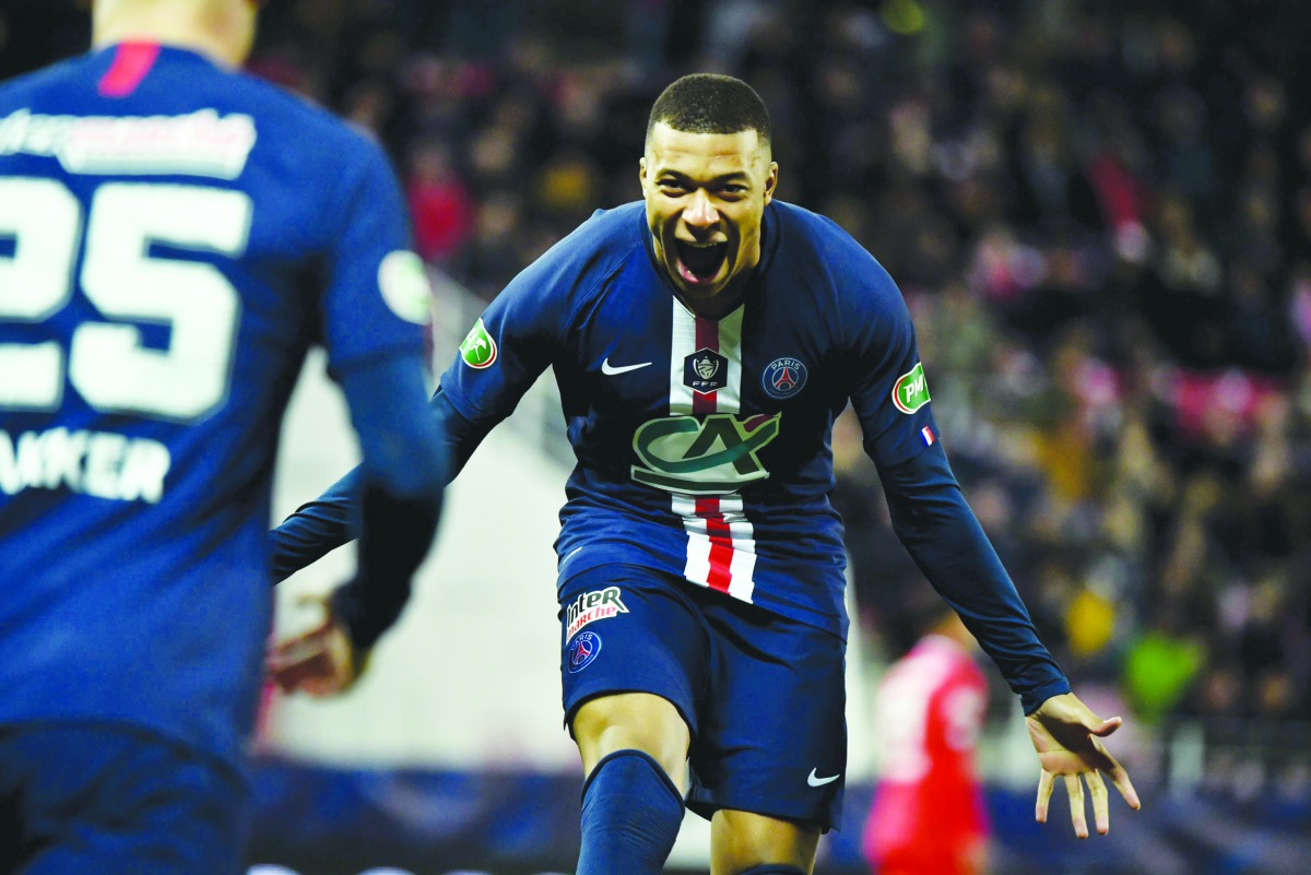  Paris Saint-Germain's French forward Kylian Mbappe celebrates after an own goal by a Dijon player during the French Cup quarter final football match Dijon (DFCO) vs Paris Saint-Germain (PSG) on February 12, 2020 at the Gaston Gerard stadium in Dijon. AFP