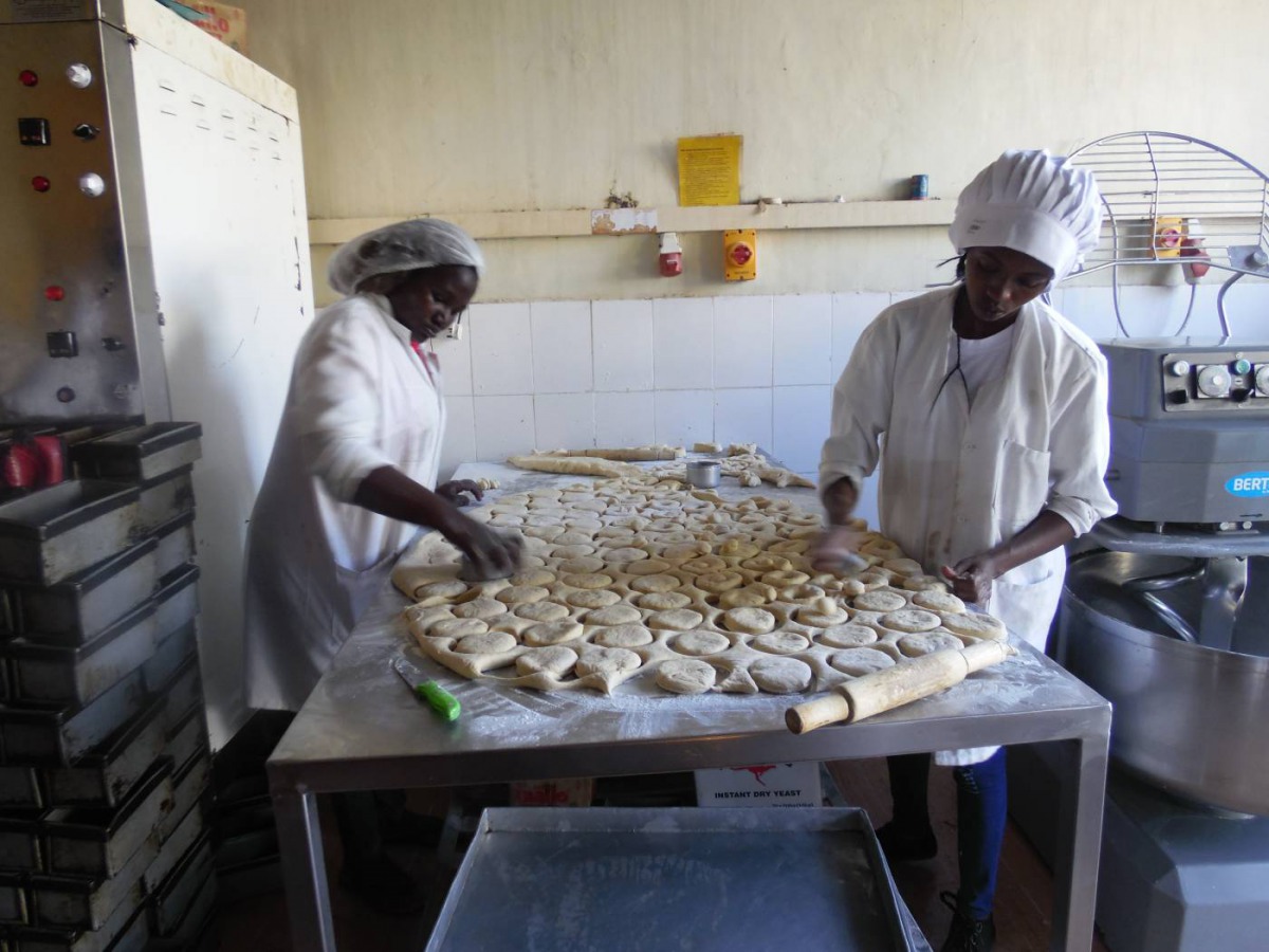 Workers produce sweet potato products at a processing factory in Maua, Meru County, Kenya, January 26, 2020. Thomson Reuters Foundation/Caroline Wambui