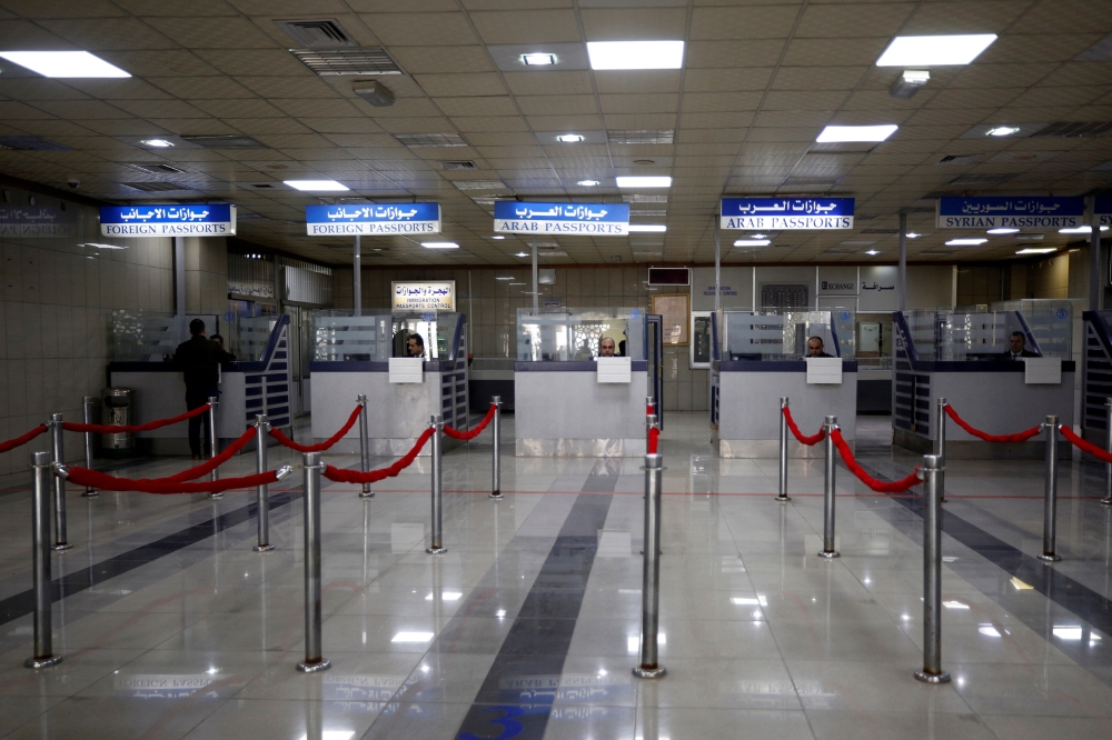 Passport control counters are pictured inside Aleppo international airport that has been reopened for the first time in years, Syria February 19, 2020. REUTERS/Omar Sanadiki