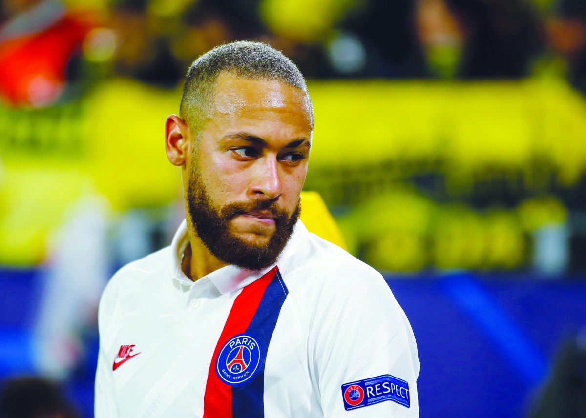 Paris St Germain's Neymar looks dejected after Borussia Dortmund's Erling Braut Haaland scored their first goal. Reuters/Leon Kuegeler