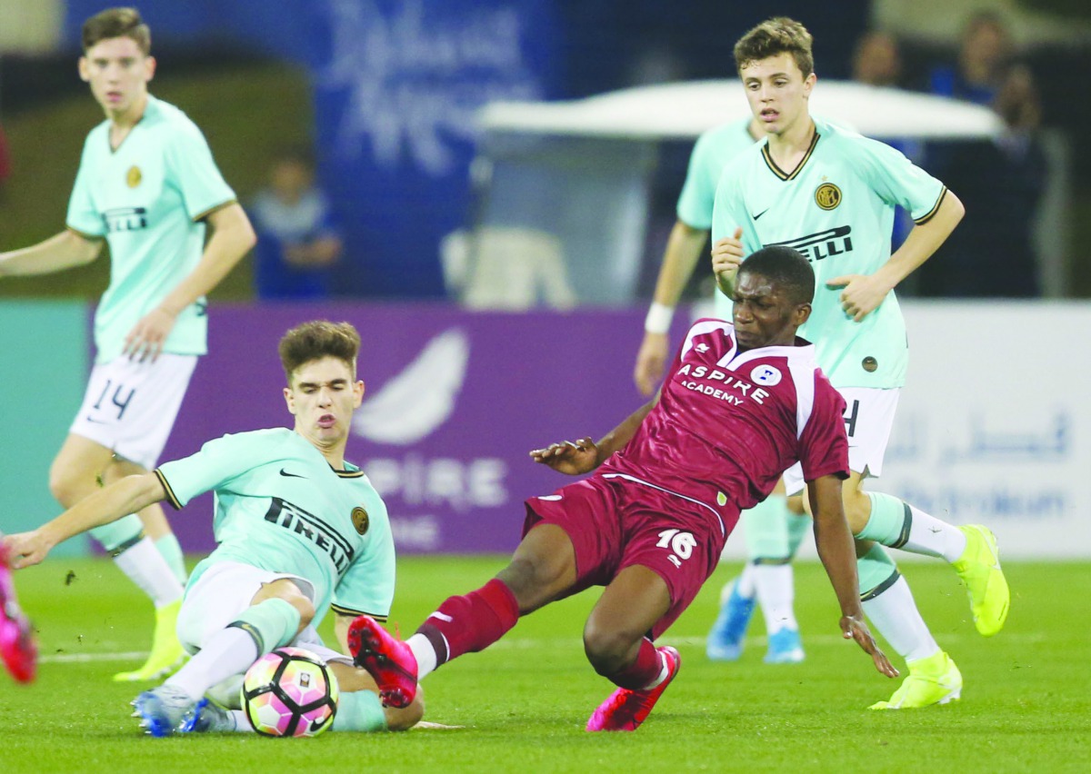 Players of Inter Milan and Aspire Academy vie for ball possession during the Al Kass Cup International at Aspire Academy pitch yesterday.