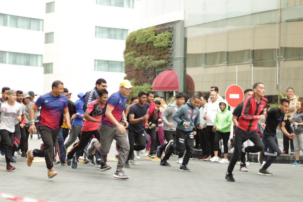 Holiday Villa staff taking part in a marathon during the National Sport Day celebrations.