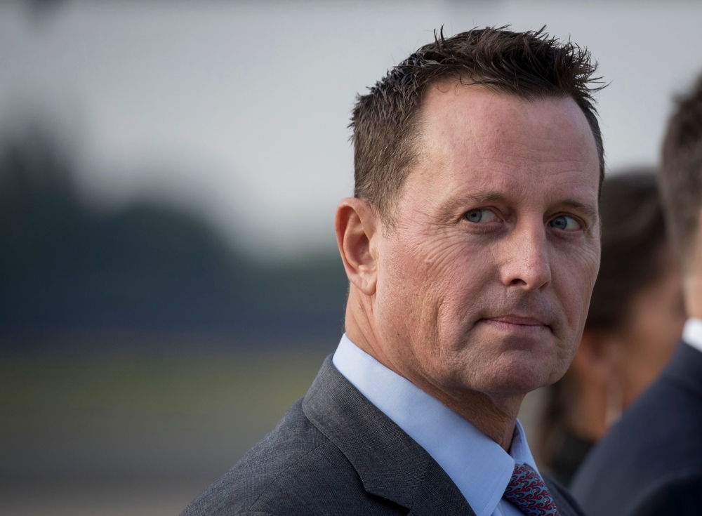  In this file photo taken on May 31, 2019 US ambassador to Germany Richard Grenell awaits the arrival of US Secretary of State at Tegel airport in Berlin. AFP / Odd Andersen
 