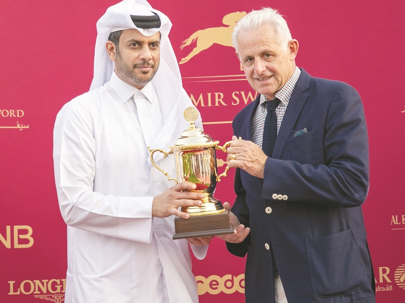 Asian Equestrian Federation and Qatar Equestrian Federation President, Hamad bin Abdulrahman Al Attiya (left), presenting the Al Zubara trophy to Alban Elie Marie De Mieulle, trainer of winner Mehdi, at the Al Rayyan Park yesterday