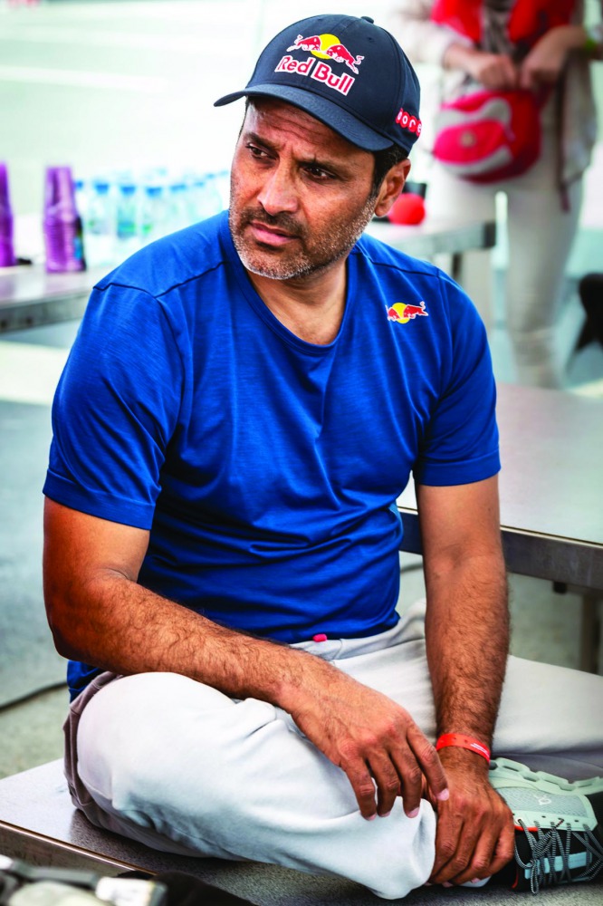 The defending champion, Qatar's Nasser Saleh Al Attiyah and French navigator Matthieu Baumel driving their Toyota Hilux during the opening 171.25km selective section of the Manateq Qatar Cross-Country Rally, yesterday.