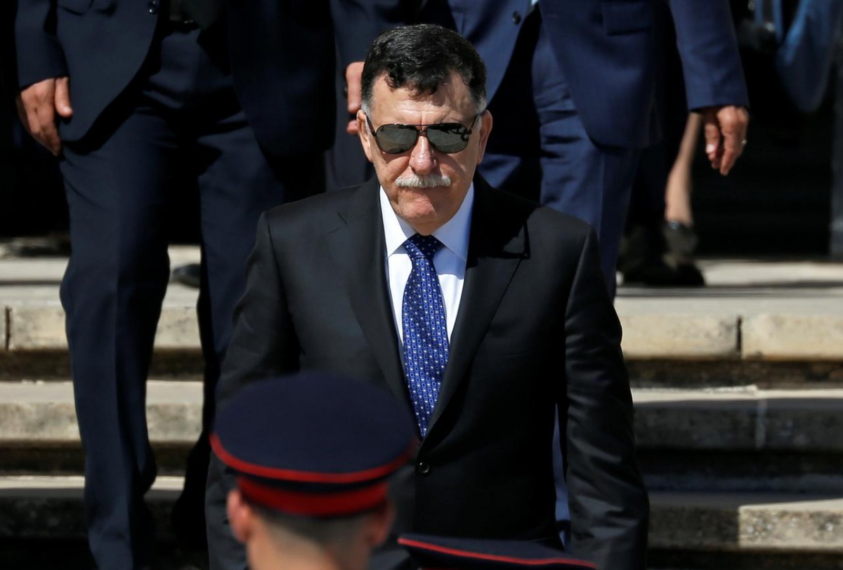 FILE PHOTO: Prime Minister of the U.N.-backed Libyan government, Fayez al-Sarraj, leaves after talks with Malta's Prime Minister Joseph Muscat at the Auberge de Castille in Valletta, Malta May 27, 2019. Reuters/Darrin Zammit Lupi