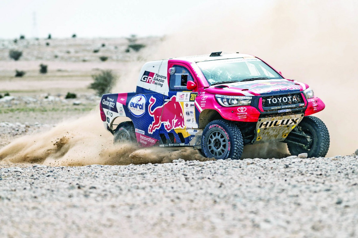 Qatar's Nasser Saleh Al Attiyah and French navigator Matthieu Baumel driving their Toyota Hilux during yesterday's stage of the Manateq Qatar Cross-Country Rally.