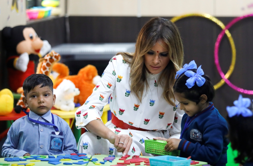 US first lady Melania Trump plays with children at the Sarvodaya Co-Education Senior Secondary School in Moti Bagh, in New Delhi, during a visit by U.S. President Donald Trump in India, February 25, 2020. Reuters/Anushree Fadnavis