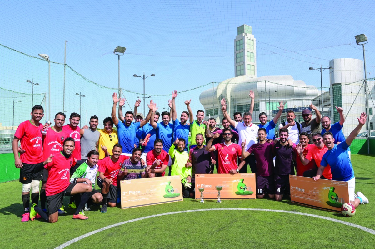 Winners of al khaliji  Football Tournament celebrate during the prize distribution ceremony.