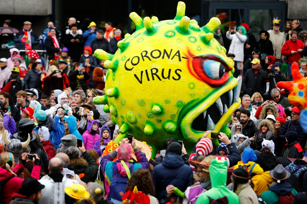  A figures depicting the coronavirus is pictured during the 