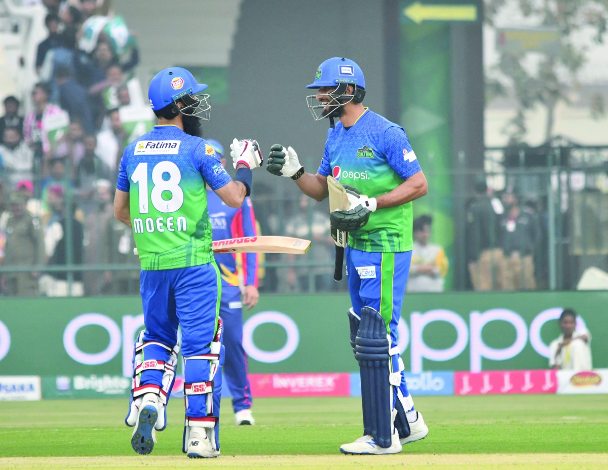 Multan Sultans captain Shan Masood (right) and Moeen Ali during the PSL match against Karachi Kings in Multan yesterday.
