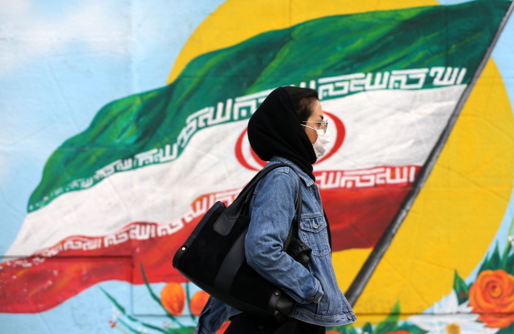  A woman wears a medical mask as a precaution against coronavirus (COVID-19) on February 26, 2020 in Tehran, Iran. (Fatemeh Bahrami / Anadolu Agency)
 