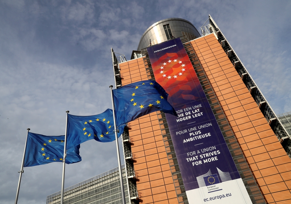 European Union flags fly outside the European Commission headquarters in Brussels, Belgium, December 19, 2019. Reuters / Yves Herman