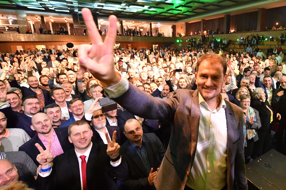 Igor Matovic, leader of the anti-graft political movement Ordinary People and Independent Personalities (OLaNO), gestures on stage during the party's parliamentary election evening in Trnava, Slovakia on February 29, 2020. AFP / Joe Klamar
 